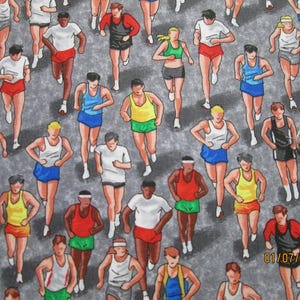 May include: Fabric with a repeating pattern of runners in various colored athletic attire. The runners are depicted in motion on a gray background. A silver sewing machine bobbin is in the image.