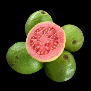 May include: A cluster of guavas against a black background. One guava is cut open, revealing a vibrant pink interior with small seeds. The other guavas are green with a slightly rough texture.