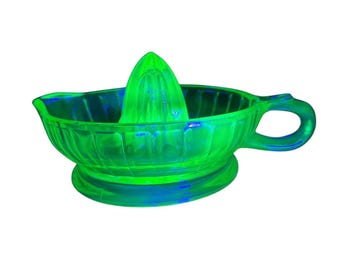 Uraniumglas sapcentrifuge vintage groen depressieglas citrus ruimer keuken