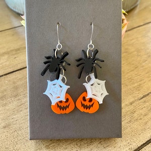 Halloween Cascade Earring. Spider Web Pumpkin.  Laser Cut Acrylic.  Shop Name: Jillmccp. JMP Designs