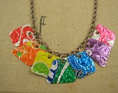 7 Pieces of 8 Necklace. DOUBLE-sided and Embossed. Recycled Soda Can Art. RAINBOW