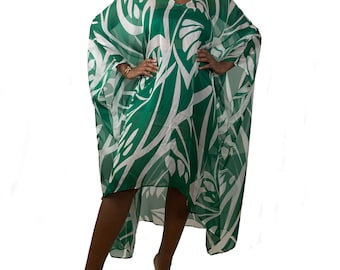 May include: A green and white patterned kaftan with a V-neckline. The kaftan is made of a sheer fabric and has a high-low hemline.