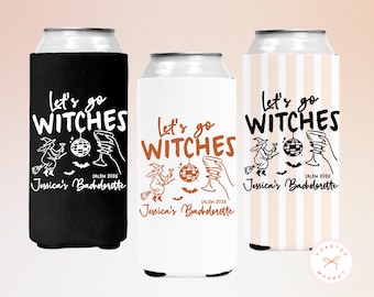 May include: Three can coolers with the text "Let's go WITCHES" and "Jessica's Bachelorette" in black, white, and orange. The design includes a witch on a broom, a disco ball, a wine glass, and bats. The background is a light pink.
