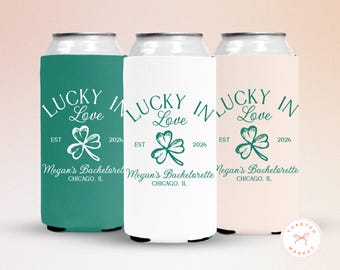 May include: Three can coolers in teal, white, and beige, each with the text "LUCKY IN Love" and a shamrock graphic. The text "Megan's Bachelorette CHICAGO, IL" is also printed on the coolers. The year "2026" is included.