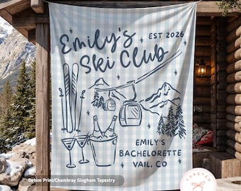 May include: A light blue and white gingham tapestry with the text "Emily's Ski Club EST 2026". The design includes ski equipment, a ski lift, mountains, and champagne. The text "Emily's Bachelorette Vail, CO" is also included.
