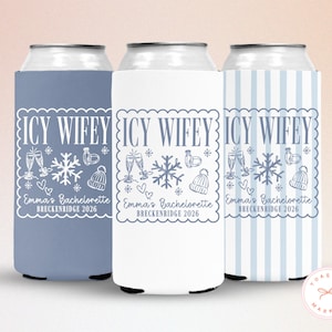 May include: Three can coolers with the text "ICY WIFEY" and winter-themed graphics. The coolers are in light blue, white, and blue striped patterns. Text at the bottom reads "Emma's Bachelorette Breckenridge 2026".