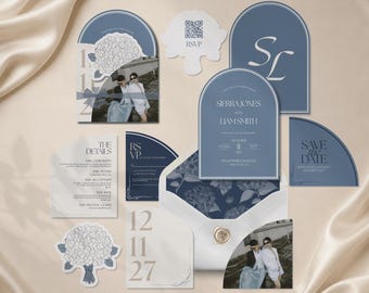 May include: A wedding stationery set in dusty blue and white, featuring arched cards with serif typography, a photo card, a floral-patterned envelope liner, a wax seal, and a QR code RSVP card. Text includes Sierra Jones and Liam Smith.