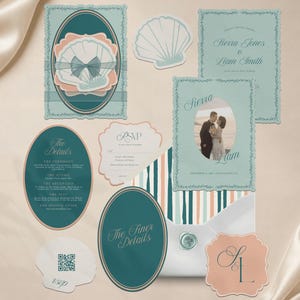 May include: A wedding stationery suite featuring teal and peach accents, including oval and rectangular cards with shell motifs, a photo card of a couple, an RSVP card with a QR code, and a white envelope sealed with a wax stamp featuring the initials S and L.