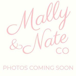 May include: A light pink logo with the words "Mally & Nate CO" in a cursive font. Below the logo, the text "PHOTOS COMING SOON" is displayed in a sans-serif font. The background is a soft white color.