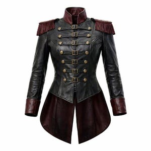 May include: Black leather jacket with burgundy accents, featuring a high collar, multiple brass buttons, and decorative shoulder fringe. The jacket has a tailored fit and a unique, asymmetrical hemline, creating a stylish and distinctive look.