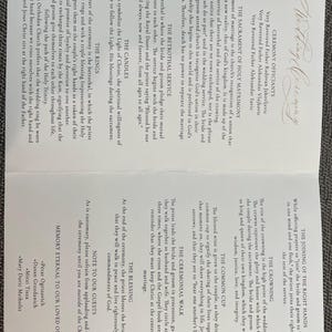 May include: A wedding ceremony program with a white background and black text. The program includes the order of service, the names of the officiants, and the names of the bride and groom.