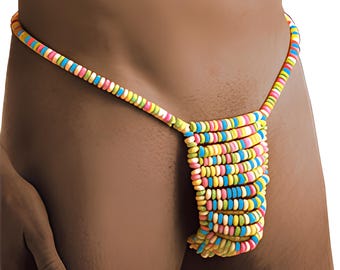 May include: A colorful candy thong made of stacked, round candies in various colors. The thong's string and the front section are made of the same candies. The candies are in shades of yellow, pink, blue, green, and orange.