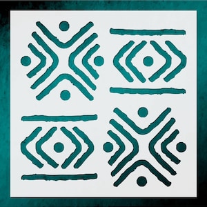 May include: A white stencil with four repeating teal geometric patterns. Each pattern features a central diamond shape with curved lines and dots. The stencil is on a teal background, creating a contrast.