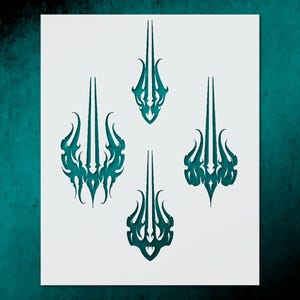 May include: Four teal-colored, stylized trident designs on a white background. Each trident has a unique, ornate flame-like pattern at the base and along the central tines. The designs are symmetrical and appear to be cut-out stencils.