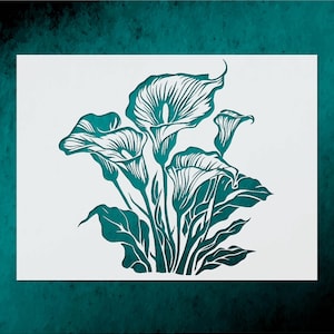 May include: A teal-colored stencil of calla lilies on a white background. The floral design features detailed lines and curves, depicting the elegant shape of the flowers and leaves. The stencil is set against a dark teal backdrop.