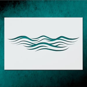 May include: A white stencil featuring a teal wave design. The wave pattern consists of several curved lines, creating a flowing, ocean-like appearance. The stencil is on a white background, with a teal textured background.
