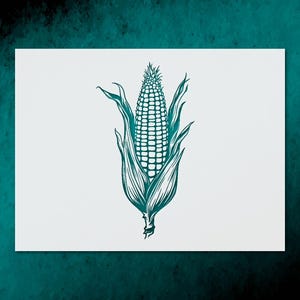 May include: A teal-colored illustration of an ear of corn on a white background. The corn is detailed with rows of kernels and surrounded by green leaves. The artwork has a vintage, botanical feel.