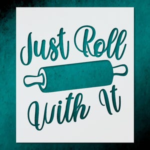 May include: A white stencil with the teal text "Just Roll With It" and a teal rolling pin illustration. The text is in a cursive font, and the rolling pin is centered between the words.