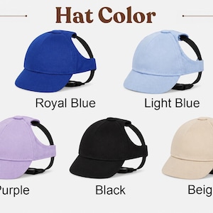May include: A collection of dog baseball caps in various colors: royal blue, light blue, purple, black, and beige. Each cap has a black strap and the text "Hat Color" is displayed at the top.