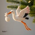 Handmade Wool Felt Stork Ornament | Needle-Felted Newborn Celebration Decor | Unique Gift for New Parents | Baby Shower or Spring Decoration product logo