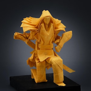 Sculpture Origami Samurai. Origami Samurai. Yellow paper. Origami figure. Character. Gift. Curiosity. Collection. Swordsman.