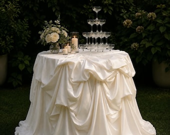 Mantel de seda color marfil de lujo – Elegante mantelería para bodas y eventos.