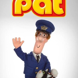 May include: A figure of Postman Pat, wearing a blue uniform and hat, waving with his right hand. He has glasses and a long nose. A black and white cat is at his feet. The words "Postman Pat" are in yellow letters above.