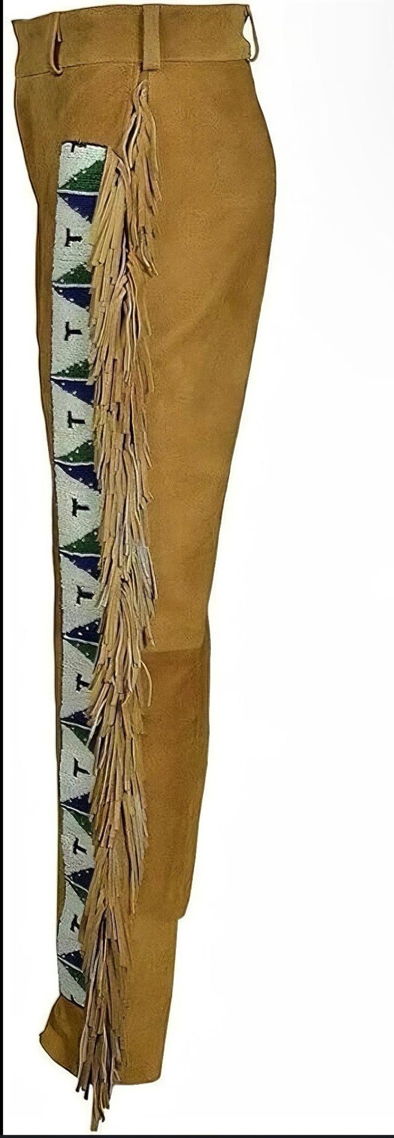 May include: Tan suede pants with decorative fringe along the side. The pants feature a beaded design in white, green, and blue. The pants have a belt loop and a straight leg design.