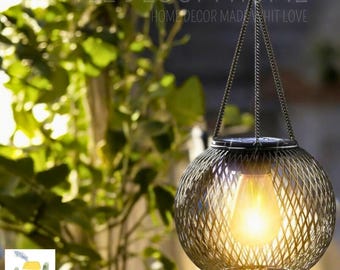 Solcellslykta i älvträdgården, hängande metalllampa