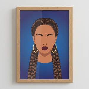 May include: A framed art print featuring a stylized illustration of a person with brown skin, dark brown braids, and gold hoop earrings. The person has dark lipstick and is wearing a blue top. The background is a gradient of blue.