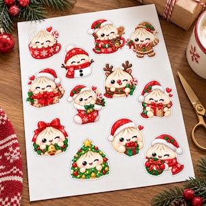 May include: A sticker sheet featuring twelve individual illustrations of cute, anthropomorphic steamed buns dressed in various Christmas-themed outfits, including Santa hats, scarves, and holiday accessories like gift boxes, wreaths, and candy canes.