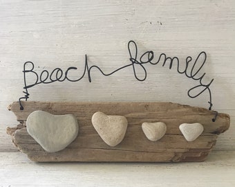 Wire words “Beach Family” with heart stones on driftwood wall art