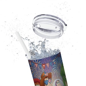 May include: A stainless steel tumbler with a clear lid and white straw. The tumbler features a colorful design with fireworks, flags, and cartoon characters. Water splashes around the tumbler, suggesting it is being filled.