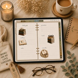 May include: A digital planner displayed on a tablet screen featuring sections for priorities, to-do lists, and reading logs with illustrations of stacked books, glasses, and a cozy nook. The interface includes tabs for navigation and a clean, neutral layout.