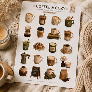 May include: A sticker sheet titled COFFEE & COZY containing 20 individual stickers featuring illustrations of coffee mugs, a cupcake, a moka pot, a cinnamon roll, a candle, a coffee bag, and a chalkboard sign with the text coffee warmth and kindness.