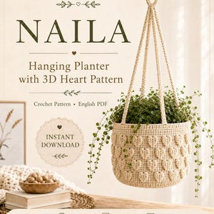 Könnte beinhalten: Ein beigefarbener gehäkelter Hängepflanzer mit 3D-Herzmuster, der eine grüne Rankpflanze enthält. Der Text lautet NAILA Hanging Planter with 3D Heart Pattern, Crochet Pattern, English PDF, INSTANT DOWNLOAD, INTERMEDIATE LEVEL und PRINTABLE PATTERN.