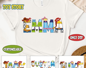 May include: A white t-shirt with a design of the characters from Toy Story spelling out the name "Emma". The design is customizable and can be changed to other names. The text "Ready to Press DTF Transfer" and "Toy Story" are at the top of the image. The text "Only DTF" is in the bottom right corner of the image.