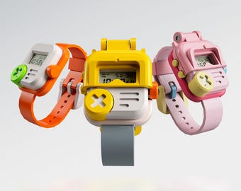 May include: Three colorful digital watches with a retro design. The watches feature bright orange, yellow, and pink straps and cases. Each watch has a small digital display showing the time. The buttons are designed to look like game console buttons.