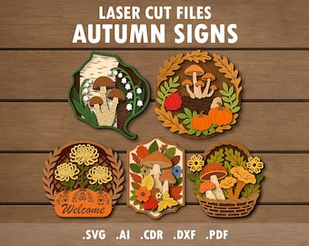 Op de afbeelding: Houten lasergesneden bestanden voor herfstborden. De borden hebben paddenstoelen, pompoenen en bloemen. De borden hebben verschillende vormen, waaronder een blad, een cirkel en een mand. De tekst "LASER CUT FILES AUTUMN SIGNS" staat bovenaan.