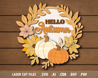 May include: Wooden autumn-themed sign with the words "HELLO Autumn" in a decorative font. The sign features a wreath of leaves, flowers, and pumpkins in shades of orange, yellow, and cream. The background is a wood-grain pattern.