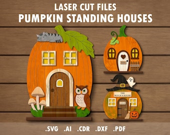 May include: Laser cut files for pumpkin-shaped standing houses. The houses are orange with brown doors and windows. One has a cat on top, another has a witch's hat and ghost, and the third has an owl. The text reads "Pumpkin Standing Houses".