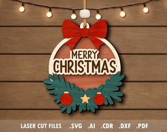 May include: Wooden Christmas wreath with a red bow, the words "MERRY CHRISTMAS", and green and red accents. The wreath is hanging against a wood-paneled background. A string of lights hangs above the wreath.