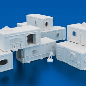 May include: A set of three ceramic mugs with a speckled, matte finish. The mugs are in shades of cream, light gray, and dark gray. Each mug has a simple, minimalist design, perfect for coffee or tea.