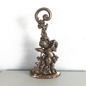 Nineteenth Century Victorian Cherub Door Stop Cast Brass Iron Weighted Base