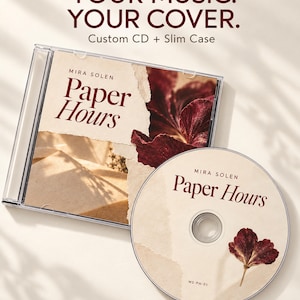 May include: A custom CD and slim case featuring the text "YOUR MUSIC. YOUR COVER. Custom CD + Slim Case" and "MIRA SOLEN Paper Hours". The design includes a cream-colored background with torn paper edges and a dark red dried flower petal graphic.
