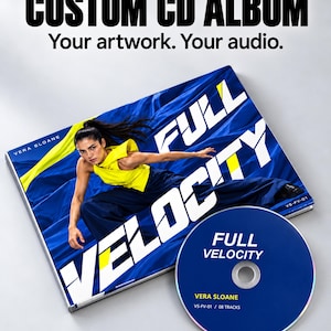 May include: A custom CD album case and disc featuring the text FULL VELOCITY and VERA SLOANE. The cover art displays a person in a yellow top and dark pants against a blue fabric background. The disc is blue with white text reading FULL VELOCITY.