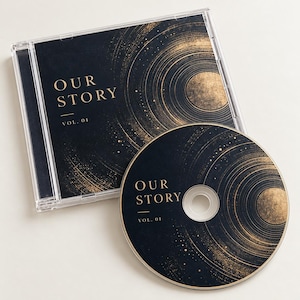 May include: A clear plastic CD jewel case and a matching compact disc featuring a dark navy blue background with gold circular patterns. The text OUR STORY and VOL. 01 is printed in gold on both the case cover and the surface of the disc.