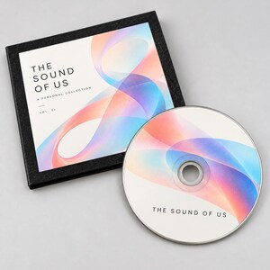 May include: A square black CD case and a matching circular CD disc. The cover and disc feature a white background with abstract, flowing gradients of pink, orange, and blue. The text reads THE SOUND OF US A PERSONAL COLLECTION VOL. 01.