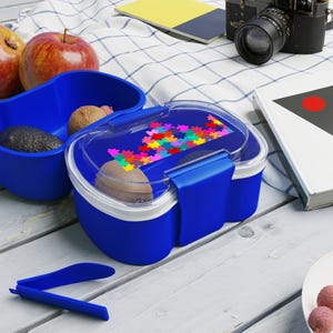 Lonchera bento de dos niveles con diseño de rompecabezas colorido, ideal para preparar comidas, meriendas infantiles, lonchera escolar y embalaje ecológico.