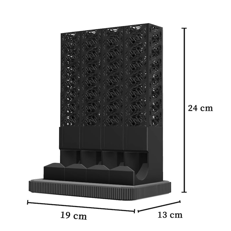 May include: A black, geometric-patterned storage unit, 24 cm tall, 19 cm wide, and 13 cm deep. The top section features a lattice design, while the base has multiple compartments. The unit is designed to hold multiple items.